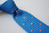 royal blue skinny knitted tie with orange polka dots